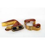 A 19TH CENTURY CALVARY OFFICER'S LEATHER AMMUNITION POUCH with cross belts, gilding and name