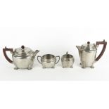 AN ART DECO STYLE 'MY LADY' ENGLISH HAMMERED PEWTER TEASET with Bakelite handles, the teapot 23cm