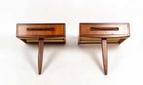 A PAIR OF G PLAN TEAK WALL MOUNTING BEDSIDE CABINETS each with a single drawer, 51cm wide x 43cm