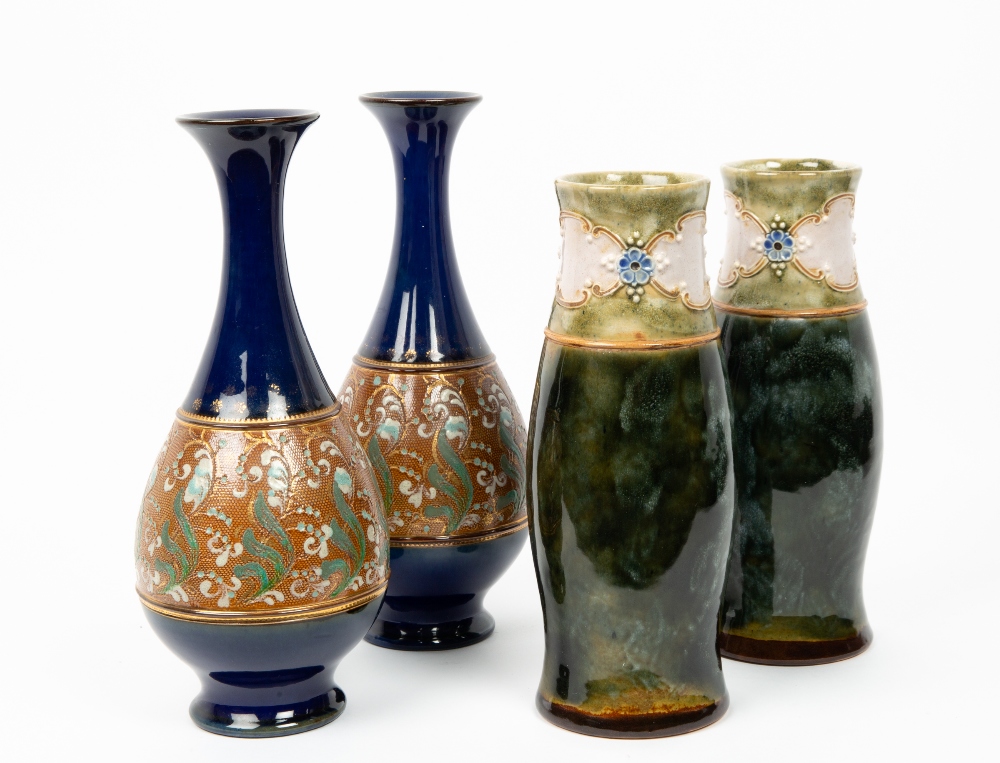 A PAIR OF DOULTON SLATER STONEWARE POTTERY BOTTLE VASES with flared rims, each 26cm in height