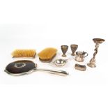 TWO SILVER BACKED BRUSHES, a silver and tortoise shell backed mirror, 29cm in length; a white