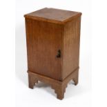 A LIMED OAK CABINET 42cm wide x 36cm deep x 79cm high Condition: surface marks, scratches and