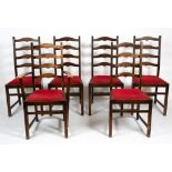 A SET OF SIX ERCOL LADDERBACK DINING CHAIRS with inset seats to include one carver, 61cm wide x 43cm