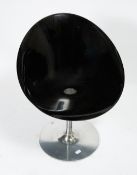 A EROS CHROME AND BLACK PLASTIC CHAIR by Kartell with Starck made in Italy, 62cm wide x 56cm deep