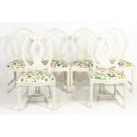 A SET OF SIX WHITE PAINTED FRENCH STYLE CONTEMPORARY KITCHEN CHAIRS the inset seats with brightly