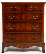 A LATE 20TH / EARLY 21ST CENTURY YEW WOOD VENEERED CHEST OF TWO SHORT AND THREE LONG DRAWERS with