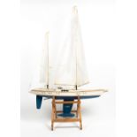 A POND YACHT on a pine stand, 103cm long x 144cm high At present, there is no condition report