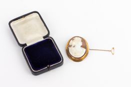 AN 19TH CENTURY WAX CAMEO with a 9 carat gold frame, 3.8cm wide x 5cm high Condition: signs of a
