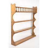 A VICTORIAN PINE FOUR TIER WALL SHELF 85cm wide x 13cm deep x 86cm high At present, there is no