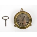 A LATE 19TH CENTURY BRASS SHIP'S CLOCK the silvered dial marked Hughes & Son Limited Opticians, 59