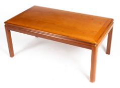 A G PLAN TEAK RECTANGULAR COFFEE TABLE with a red and gold label beneath, 107cm wide x 60cm deep x