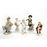 THREE MEISSEN PORCELAIN CHERUBS the largest 14cm in height together with a pair of Sitzendorf