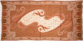 A PAISLEY STYLE RED AND CREAM GROUND SHAWL 225cm x 100cm Condition: not old, in good condition