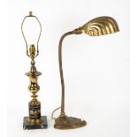A BRASS ADJUSTABLE TABLE LAMP with shell moulded shade, 51cm high (adjustable) together with a
