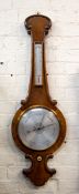A VICTORIAN WALNUT ANEROID BAROMETER overall 32cm wide x 101cm high Condition: glass intact,