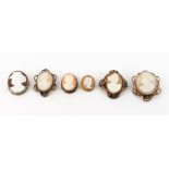 A GROUP OF SIX ANTIQUE CAMEO BROOCHES the largest 3.5cm x 5cm Condition: frames not precious
