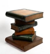 A PAINTED HARDWOOD TABLE in the form of a stack of books, 34cm wide x 31cm deep x 40cm high At