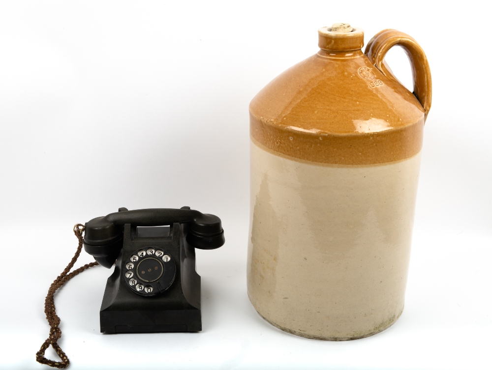 AN EARLY 20TH CENTURY BAKELITE AUTOMATIC TELEPHONE and Electric Co telephone, together with a
