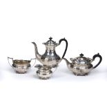 Matched silver four piece tea and coffee set consisting of: a teapot, coffee pot, milk jug and