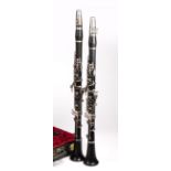 Two Boosey & Hawkes 'Symphony' cased clarinets numbered 'London 1010' (2)