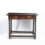 Oak side table 17th/18th century, with bobbin turned supports and a single drawer to the front, 70cm