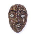 Beaded mask Cameroon or Nigeria, the full mask on a wooden base, 27cm x 18cm
