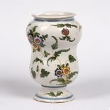 Polychrome albarello Italian, 18th Century, of baluster form painted with trailing flowers and