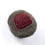 Pin cushion made for The General Strike 1924 with inscription to each side 'Help One Another' and '