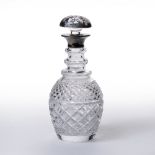 Cut glass wine decanter with hobnail cut decoration and silver collar, bearing marks for Roberts &