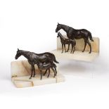 Pair of Austrian bronze and onyx bookends each in the form of a horse and foal, with impressed