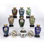 Ten cloisonne vases mostly decorated with flowers, tallest 10.5cm high together with a crackle