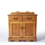 Pine cupboard or sideboard 20th Century with gallery back, two drawers above fielded panelled doors,