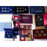 Collection of coin proof sets including: Canadian 1977 set, Isle of Man 1977 silver proof set,