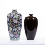 Two Chinese vases one decorated with flowers and birds on a dark blue ground, unmarked, 44cm high