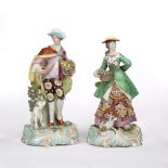 Pair of Derby porcelain figures early 19th Century, modelled as Country figures each holding a