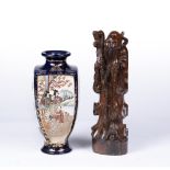 Japanese Satsuma vase of square tapering form and signature beneath, 25cm high and a carved figure