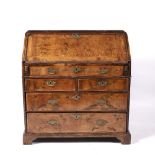 Walnut bureau George III, with fall front, enclosing drawers, pigeon holes and compartments, above