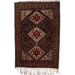 Qashqai blue ground tribal rug with three central medallions and further stylised foliate animal and