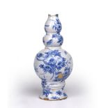 Delftware triple gourd vase circa 1760/70, painted with Oriental birds and flowers, 23cm high
