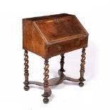 William and Mary bureau walnut, with later additions, with brass metal mounts, on barley twist legs