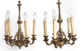 Pair of gilt brass Gothic Revival ceiling lights each with five branches, 40cm high