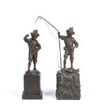 Two bronze figure groups of two children angling/fishing, the tallest measures 17cm high (2)