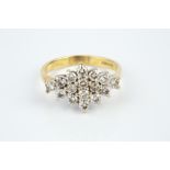 Diamond cluster ring the lozenge-shaped cluster of round brilliant-cut diamonds in claw settings,