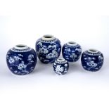Group of five blue and white ginger jars Chinese, each decorated with prunus blossom, largest 14cm