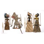 Javanese leather shadow puppet 81cm, and three painted wooden Javanese puppets, 53cm - 69cm, (4)