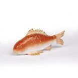 Jacob Petit porcelain model carp French late 19th Century, the fish with gilt fins and pierced body,