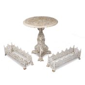 Painted cast iron circular garden table Victorian, on scroll column and triform base with