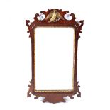 Mahogany fret wall mirror with gilt eagle to the top, 85cm x 48cm