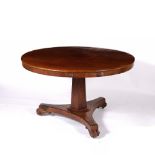 Circular centre table or dining table Victorian, with mahogany top, trumpet stem on triform base,