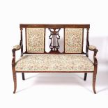 Satinwood and inlaid sofa Edwardian, 116cm across, 93.5cm high and four matching salon chairs,
